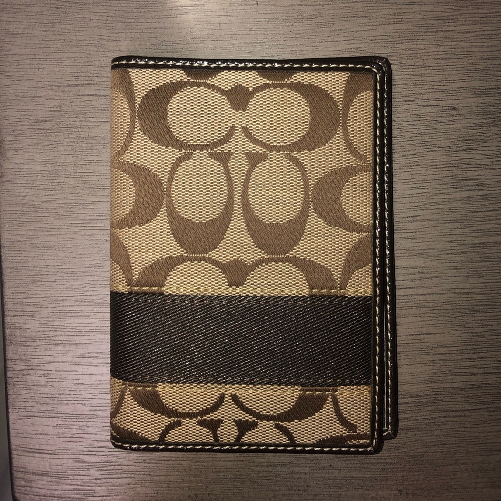 AUTHENTIC Coach Passport holder NEVER USED